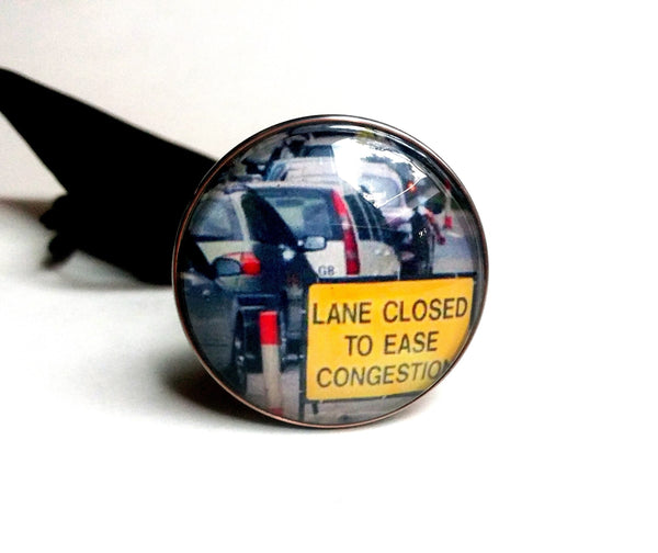 ROAD LANE CLOSED TO EASE CONGESTION SHOOTER ROD